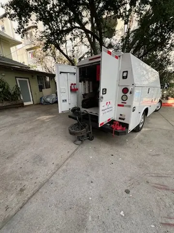 Magnet Plumbing service vehicle on-site for Grease Trap Cleaning in South Sarasota